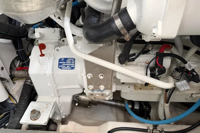  Yacht Photos Pics Engine compartment of 2023 Ferretti Yachts 500, showcasing mechanical components and wiring.