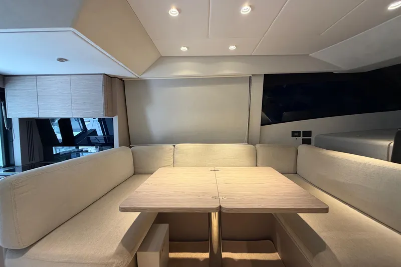  Yacht Photos Pics Luxurious interior of 2023 Ferretti Yachts 500 with elegant seating and modern design.