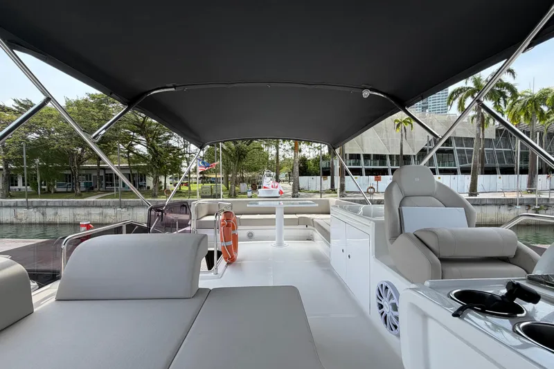  Yacht Photos Pics Luxurious 2023 Ferretti Yachts 500 interior with elegant seating and modern amenities.