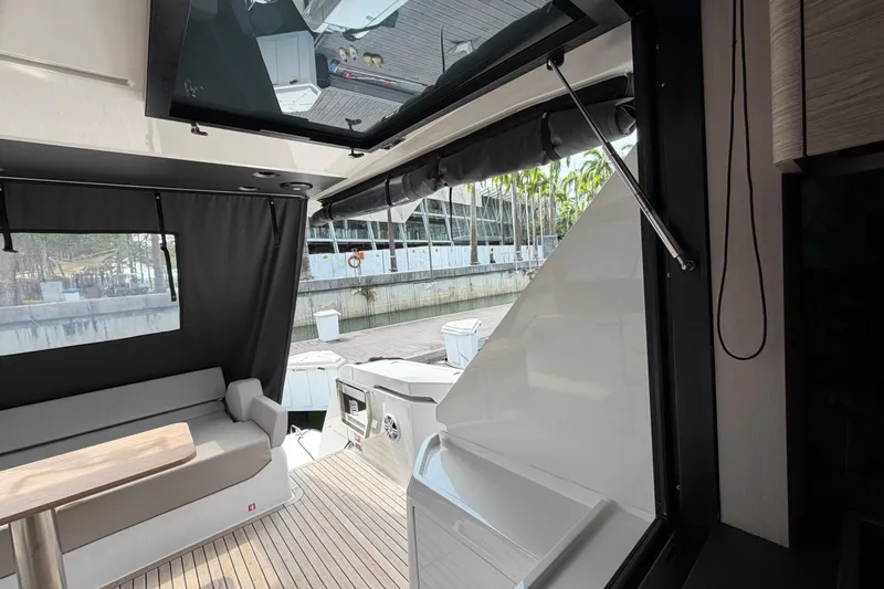  Yacht Photos Pics Luxurious interior of 2023 Ferretti Yachts 500 with elegant seating and modern design.
