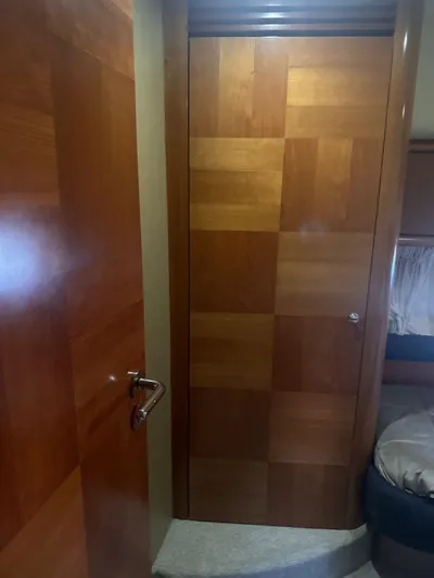  Yacht Photos Pics Interior of 2007 Azimut 55E yacht with wooden door and cozy cabin.