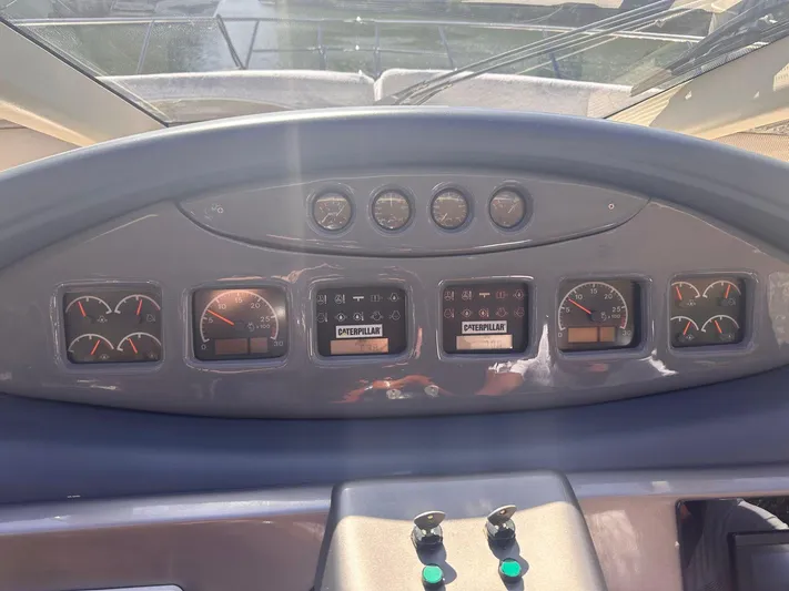 Yacht Photos Pics Control panel of a 2007 Azimut 55E yacht, featuring gauges and displays.