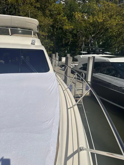  Yacht Photos Pics 2007 Azimut 55E yacht docked, featuring sleek design and spacious deck.