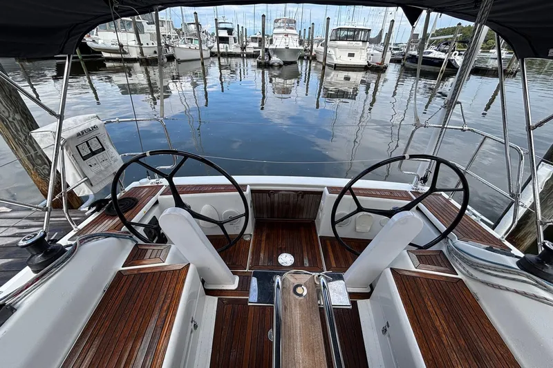 Respite Yacht Photos Pics Cockpit view of 2014 Hanse 345 sailboat docked at marina.
