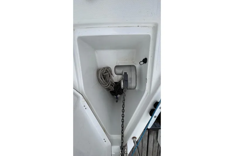 Respite Yacht Photos Pics Anchor locker of 2014 Hanse 345 sailboat with chain and rope.