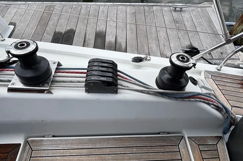 Respite Yacht Photos Pics Deck of 2014 Hanse 345 sailboat with winches and labeled rope clutches.