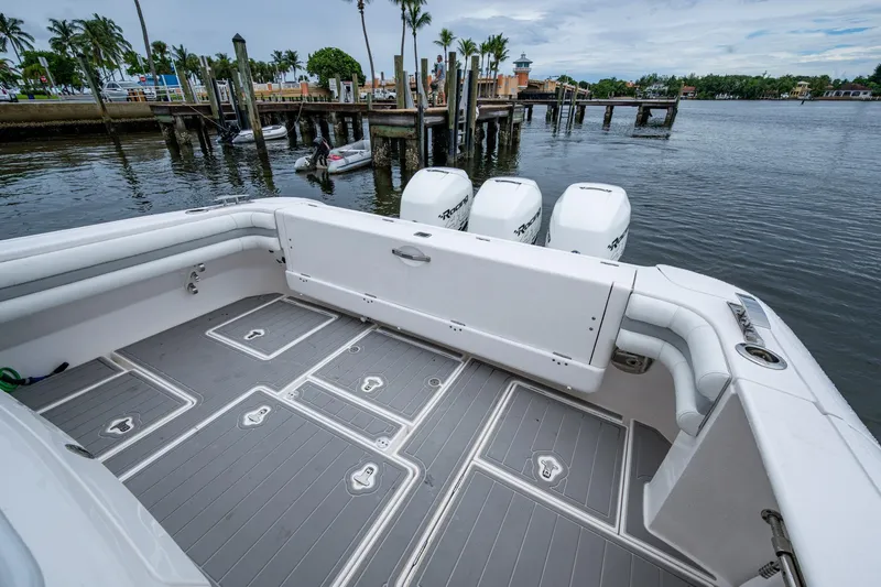  Yacht Photos Pics 2019 Intrepid 407 Cuddy boat with spacious deck and triple outboard engines.