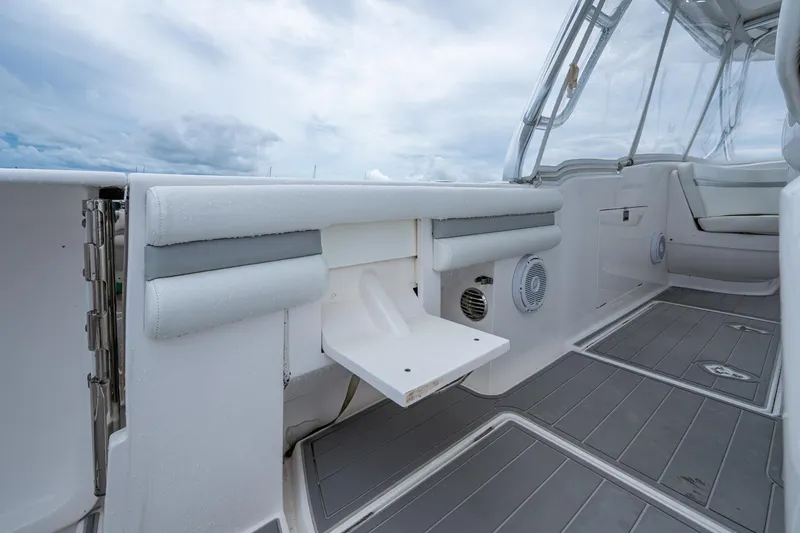  Yacht Photos Pics 2019 Intrepid 407 Cuddy boat interior with seating and deck details.
