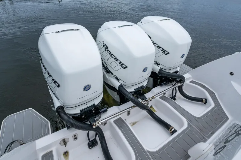 Yacht Photos Pics 2019 Intrepid 407 Cuddy with triple outboard engines on water.