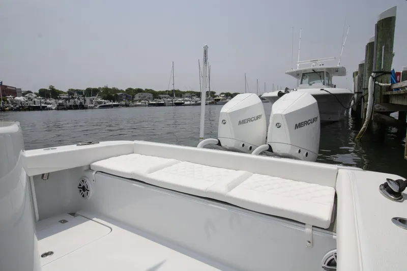  Yacht Photos Pics 2025 Yellowfin 26 Hybrid boat with twin Mercury engines docked at marina.