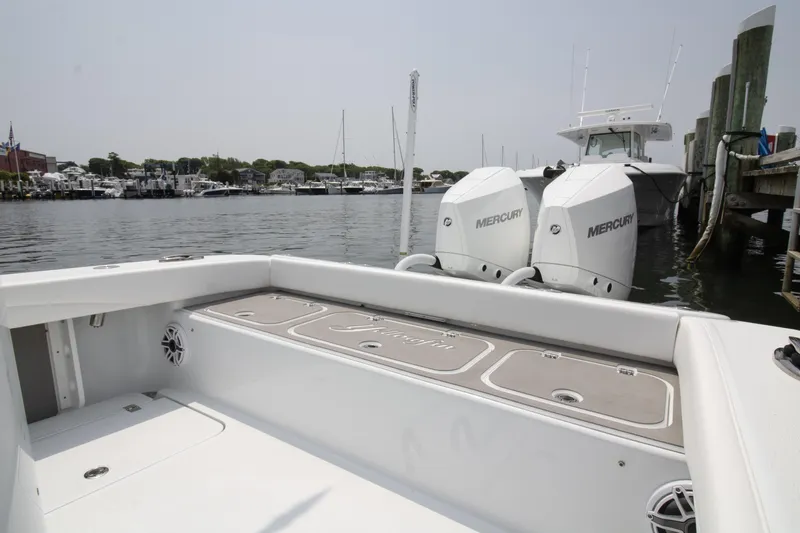 Yacht Photos Pics 2025 Yellowfin 26 Hybrid boat with dual Mercury engines docked at marina.