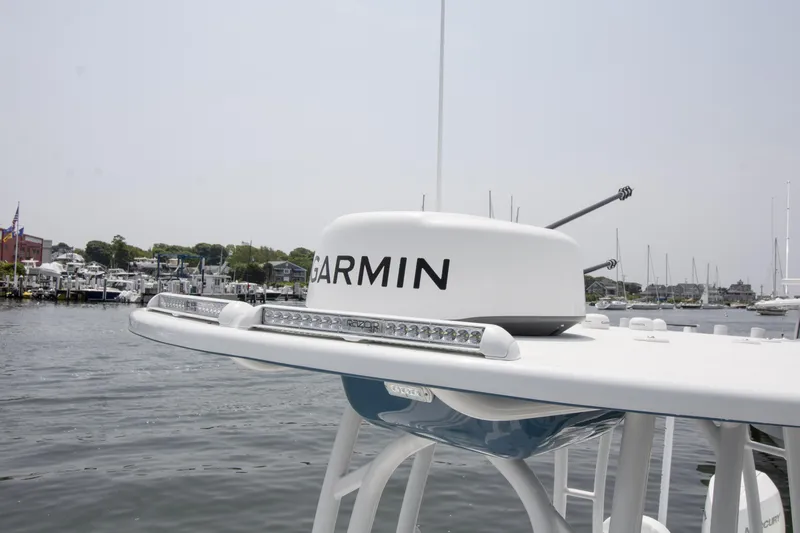  Yacht Photos Pics 2025 Yellowfin 26 Hybrid boat with Garmin radar, docked in a marina.