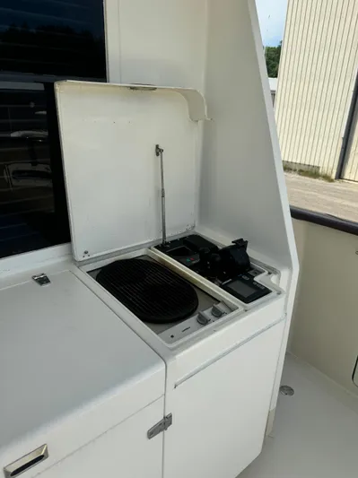 Spirit Of Zopilote Yacht Photos Pics Cokpit Electric Grill and Helm Station