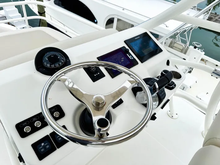 Seas The Day Yacht Photos Pics Steering console of 2017 Boston Whaler 420 Outrage with modern navigation equipment.