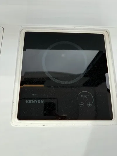Harley Quinn Yacht Photos Pics Built-in Kenyon cooktop on 2023 Regal 36 XO yacht.
