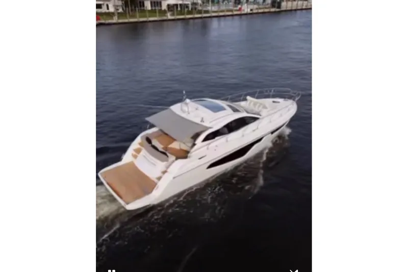  Yacht Photos Pics 2024 Sessa Marine C44 Cruiser navigating on calm waters.