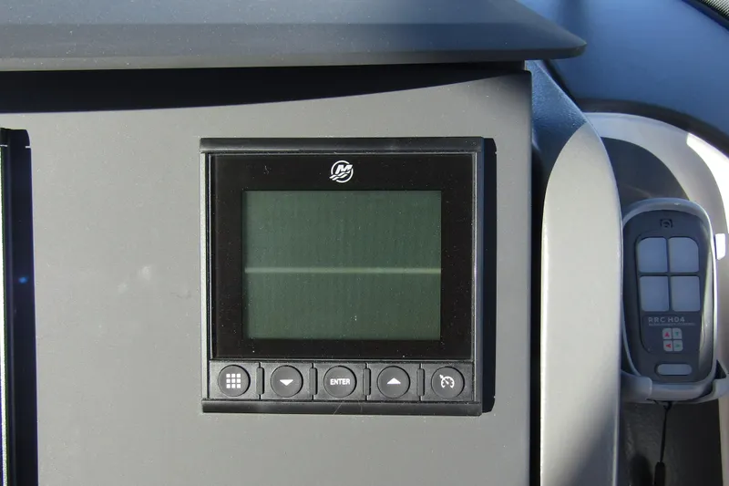  Yacht Photos Pics Control panel of 2025 Nimbus Tender 9 boat with digital display and remote control.