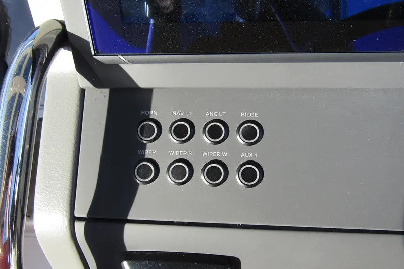  Yacht Photos Pics Control panel of 2025 Nimbus Tender 9 boat with labeled buttons.