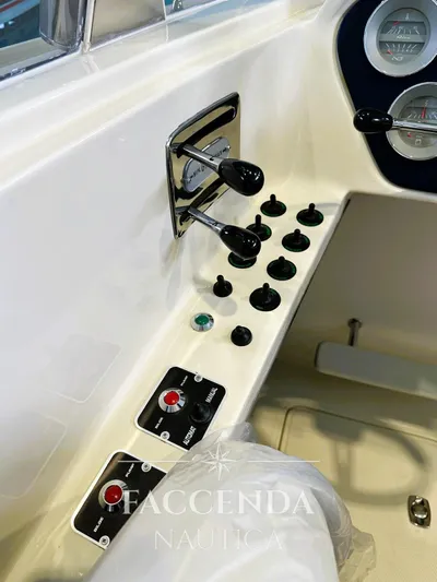  Yacht Photos Pics Control panel of a 1981 Riva SAINT TROPEZ boat with switches and gauges.