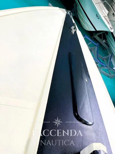  Yacht Photos Pics 1981 Riva SAINT TROPEZ boat deck, featuring sleek design and nautical branding.