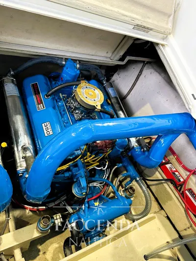  Yacht Photos Pics 1981 Riva SAINT TROPEZ engine, vibrant blue, detailed view.