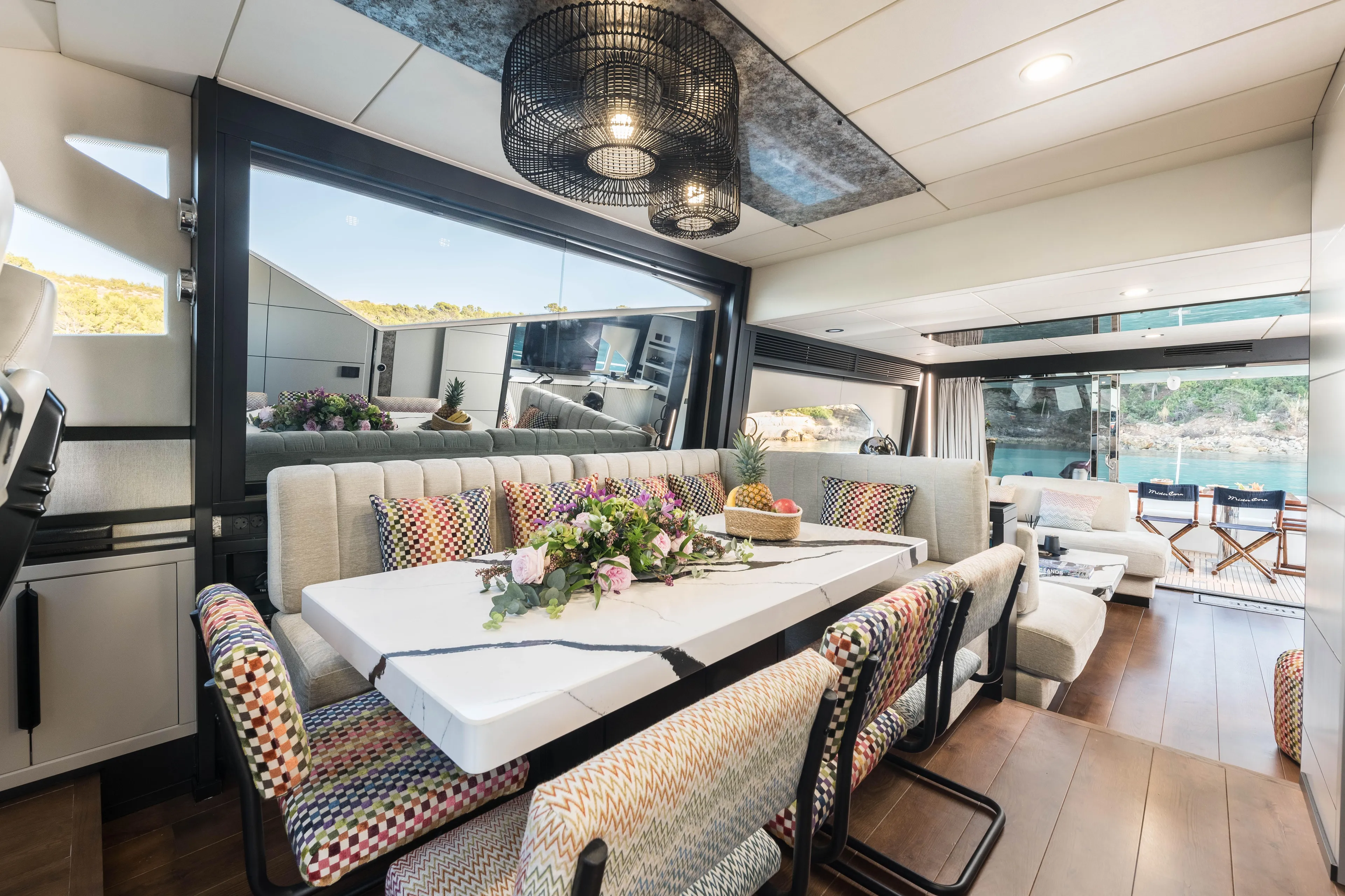 Mr Corn Yacht Photos Pics Luxurious interior of 2010 Rodman Muse 74 yacht with elegant dining area and scenic views.