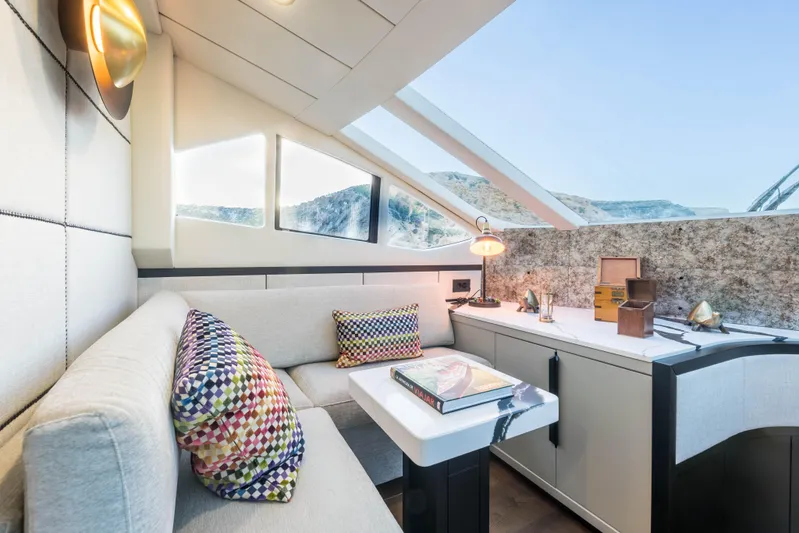 Mr Corn Yacht Photos Pics Luxurious interior of 2010 Rodman Muse 74 yacht with modern decor and scenic views.