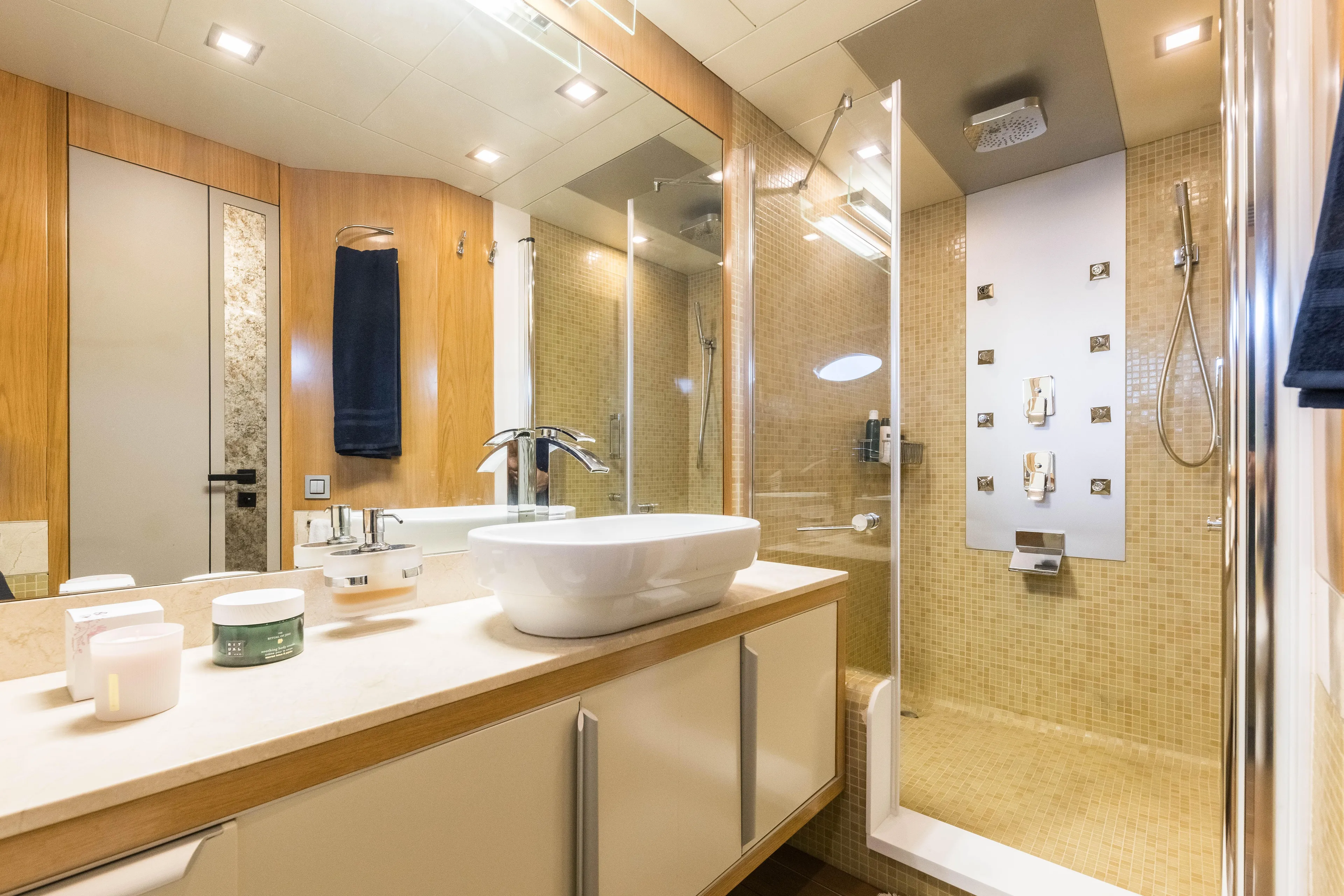 Mr Corn Yacht Photos Pics Luxurious bathroom on 2010 Rodman Muse 74 yacht with modern fixtures and elegant design.