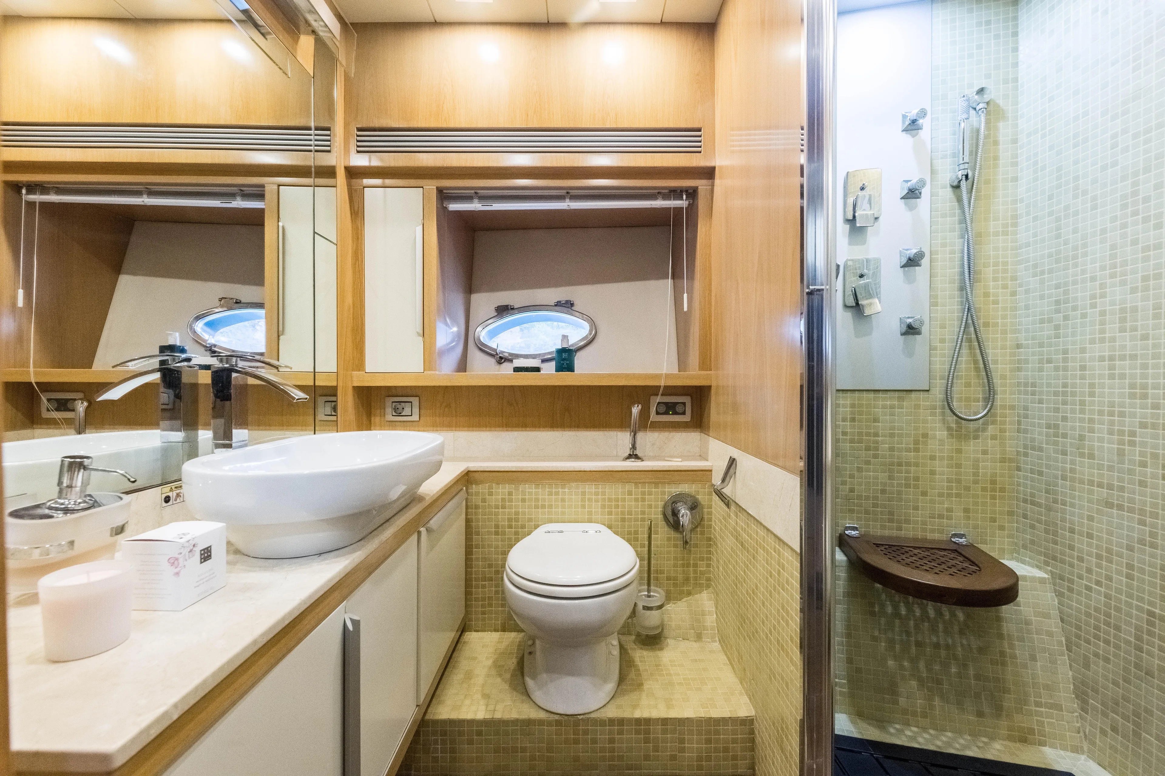 Mr Corn Yacht Photos Pics Luxurious bathroom in 2010 Rodman Muse 74 yacht with modern fixtures and shower.