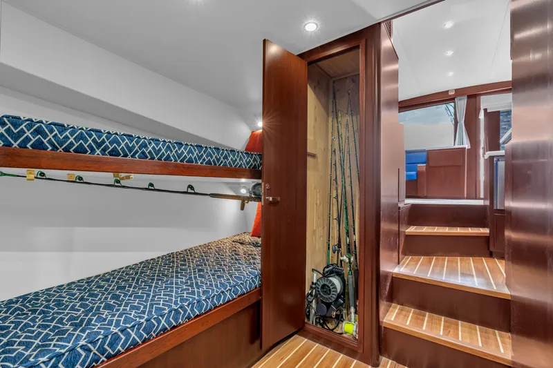 Sligo Yacht Photos Pics 2023 Henriques 42 Convertible interior with bunk beds and fishing gear storage.