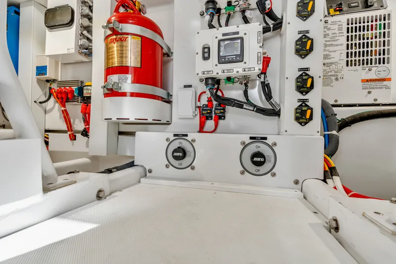 Sligo Yacht Photos Pics Engine room of 2023 Henriques 42 Convertible with fire extinguisher and control panel.