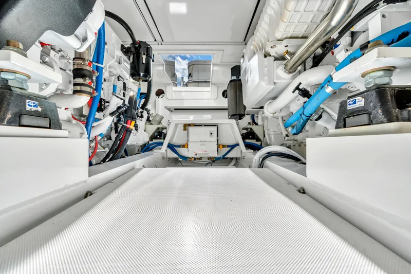 Sligo Yacht Photos Pics Engine room of 2023 Henriques 42 Convertible yacht, showcasing advanced machinery and piping.