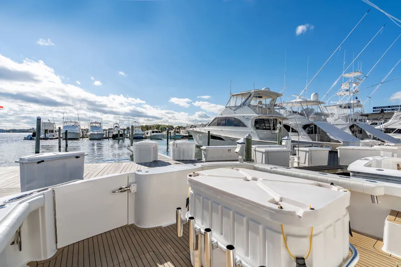 Sligo Yacht Photos Pics Docked Henriques 42 Convertible yacht, 2023 model, in a sunny marina setting.