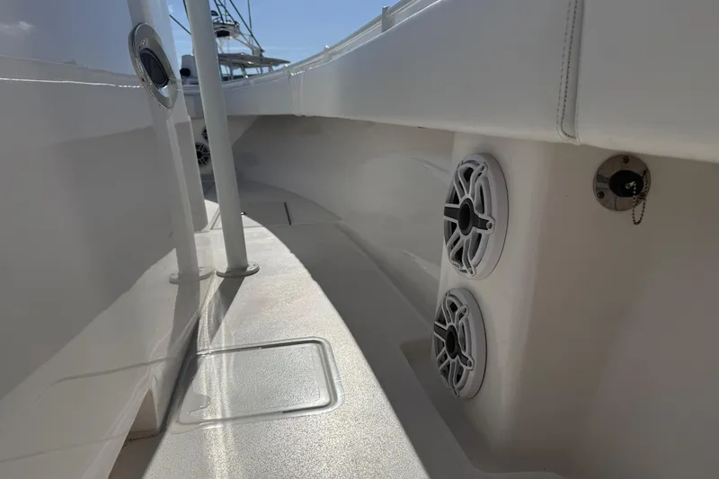  Yacht Photos Pics 2024 Contender 30 ST boat interior with speakers and sleek design.