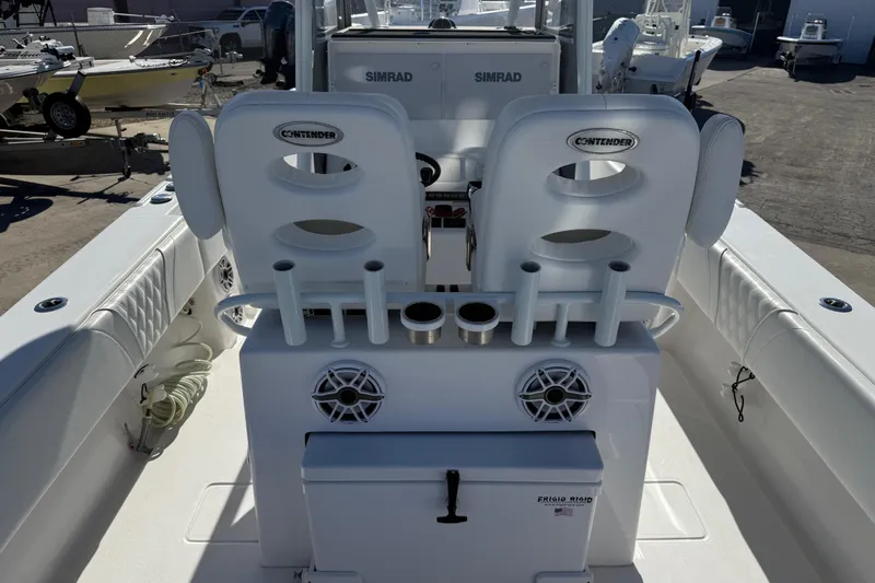 Yacht Photos Pics 2024 Contender 30 ST boat interior with seating, rod holders, and storage.