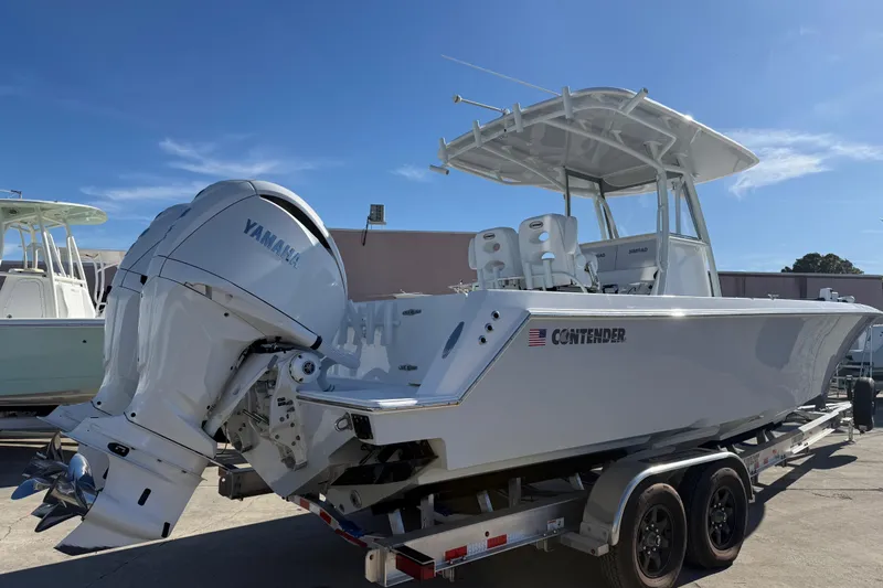  Yacht Photos Pics 2024 Contender 30 ST boat with Yamaha outboard engines on a trailer.