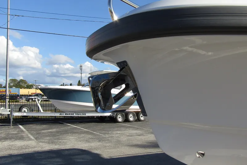  Yacht Photos Pics 2025 Nimbus Tender 9 boat on trailer under clear sky.