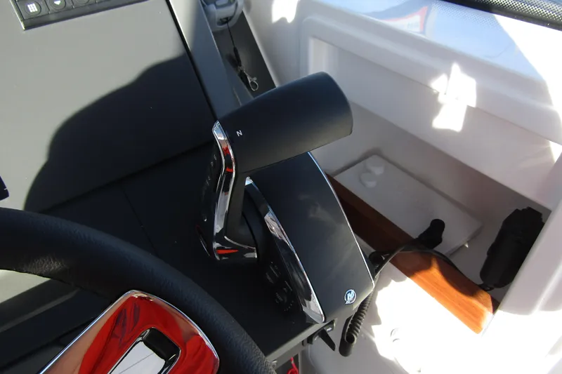  Yacht Photos Pics Control lever of 2025 Nimbus Tender 9 boat, featuring sleek design and modern technology.