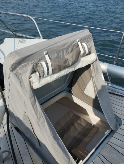 One Shot Of Cowes Yacht Photos Pics Deck hatch with canvas cover on 2010 Advanced Yachts 66, overlooking the sea.