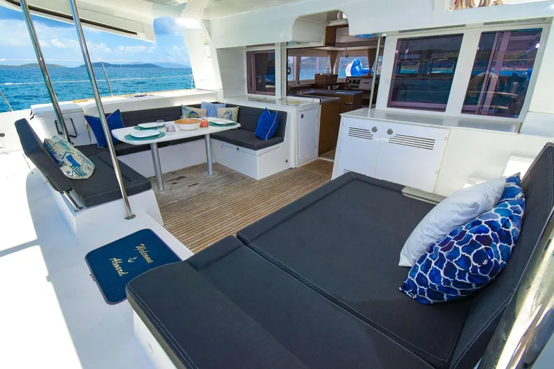 Rapscallion Yacht Photos Pics Luxurious 2018 Lagoon 450 F catamaran interior with elegant seating and ocean view.