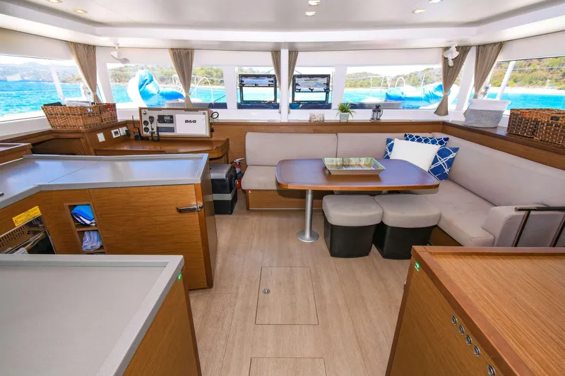 Rapscallion Yacht Photos Pics Luxurious interior of 2018 Lagoon 450 F catamaran with modern seating and navigation equipment.