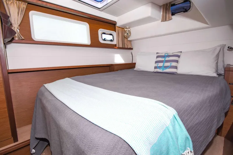 Rapscallion Yacht Photos Pics Cozy cabin interior of 2018 Lagoon 450 F yacht with nautical decor.