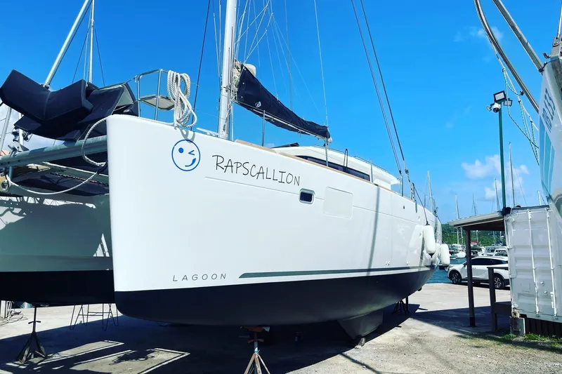 Rapscallion Yacht Photos Pics 2018 Lagoon 450 F catamaran named Rapscallion in a marina setting.