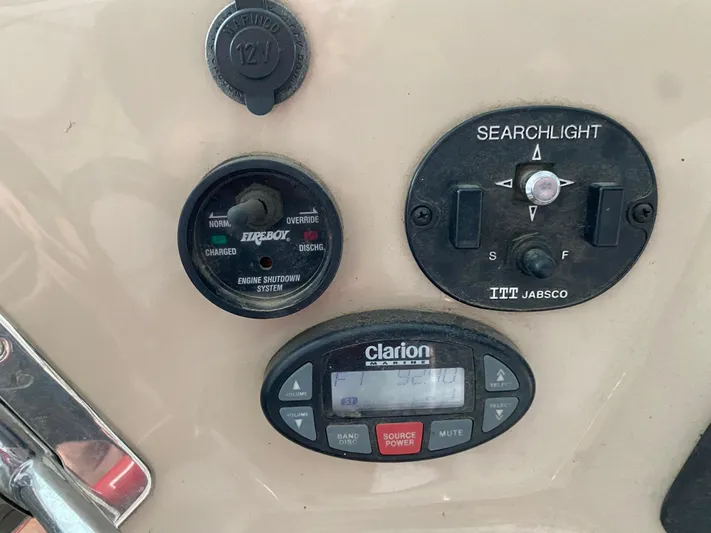  Yacht Photos Pics Control panel of a 2006 Carver 36 Mariner with searchlight and audio controls.