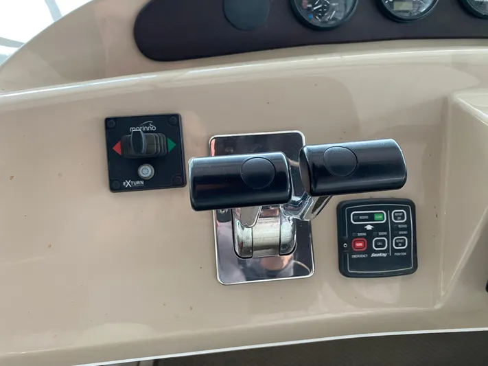  Yacht Photos Pics Control panel of 2006 Carver 36 Mariner boat with throttle and switches.