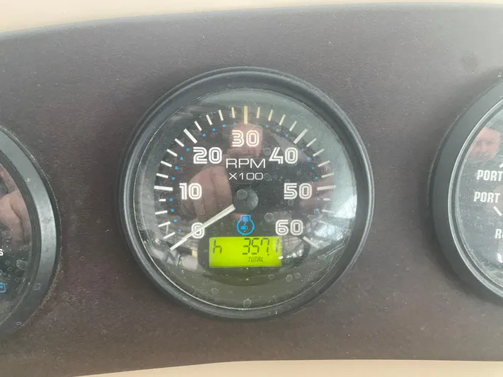  Yacht Photos Pics Close-up of 2006 Carver 36 Mariner RPM gauge displaying 357 hours.