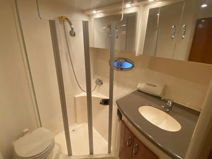  Yacht Photos Pics Bathroom interior of 2006 Carver 36 Mariner yacht with shower and sink.