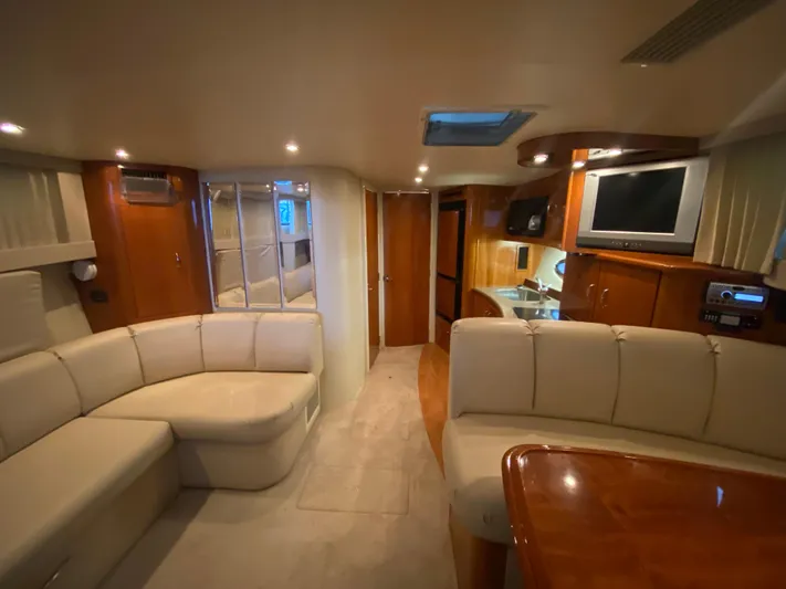  Yacht Photos Pics Interior of 2006 Carver 36 Mariner yacht with plush seating and modern amenities.