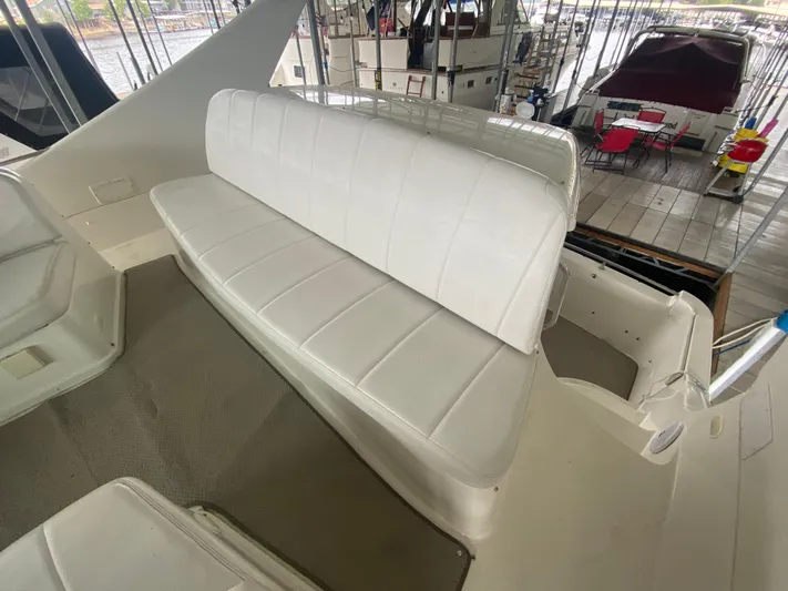  Yacht Photos Pics 2006 Carver 36 Mariner boat interior with white seating on deck.