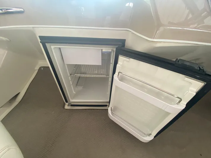  Yacht Photos Pics Open mini fridge inside 2006 Carver 36 Mariner boat interior.